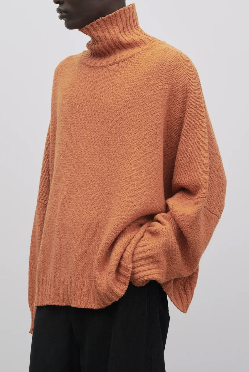 The Row orange high neck sweater